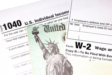 Tax return with Refund Check and W-2 Wage statement