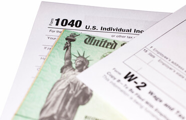 Tax return with Refund Check and W-2 Wage statement