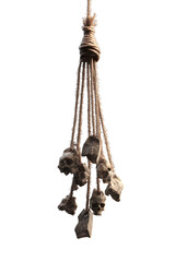 Eerie skull charms hanging from knotted rope, evokes mystery and suspense perfect for horror themes or gothic designs, Halloween, dark arts. A Halloween Design