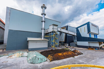 Glass piles brown bottles in a recycling industry