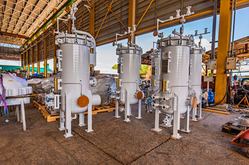 Tank of a small facility building isolated on a white