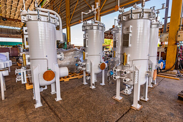 Tank of a small facility building isolated on a white