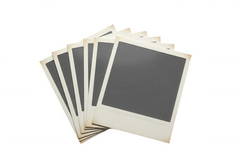 Stacked instant photo frames isolated on a transparent background