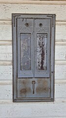 old postage stamp dispenser
