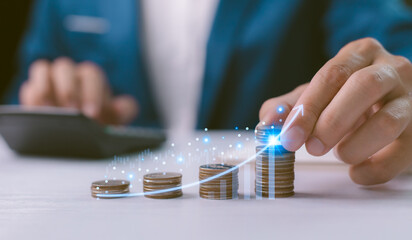Hand stacking coins with a glowing arrow and financial graph, smart investment, savings growth, and future financial success and prosperity. Strategic financial planning for wealth accumulation.