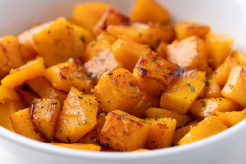 Roasted butternut squash pumpkin in a bowl, Autumn homemade food