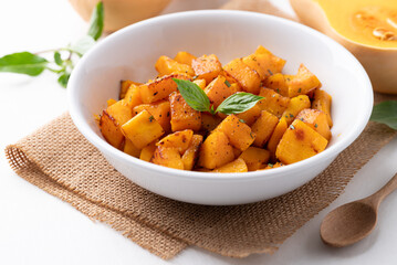 Roasted butternut squash pumpkin in a bowl, Autumn homemade food