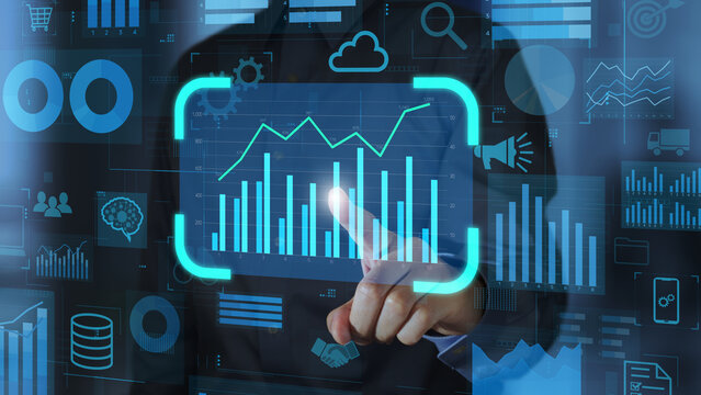 Data-driven decision making. Enterprise data integration to support business intelligence. ERP data management. Businessperson tapping a KPI chart on analytics dashboard.