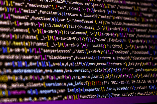 Software source code. Programming code. Programming code on computer screen. Developer working on program codes in office. Source code photo. Technology background