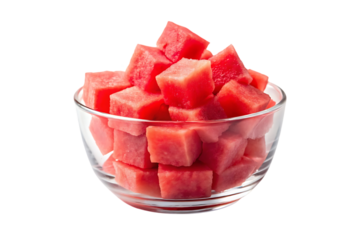 Cubed watermelon pieces in a clear glass bowl showing bright red fruit flesh, isolated on a transparent background
