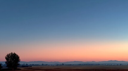 Obraz premium Elegant pastel gradient sky fading from pink to pale purple with thin horizontal horizon line below, open empty upper space ideal for design overlay, minimalist concept or advertising background.