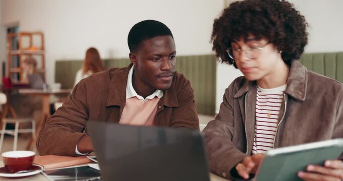 Men, students and discussion in cafe with laptop for college project, collaboration or research. University, tech or people in coffee shop with conversation for assignment, academic task or teamwork.