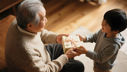 A young man and woman are talking and smiling at home with their baby and child