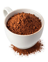 Fine, dark-brown cocoa powder fills a small, white ceramic mug.  A dusting of powder rests beneath