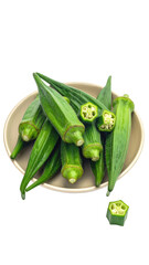 Fresh okra pods in a shallow bowl