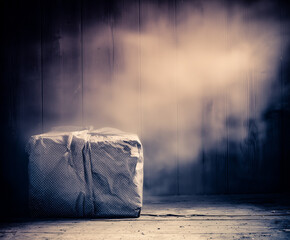 Wrapped Gift Box with Fog in Dark Room