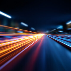 Fototapeta premium Blurred streaks of orange, yellow, and blue light create a dynamic sense of speed and motion against a dark background, resembling fast-moving traffic or futuristic light trails