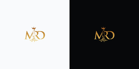 Elegant MRD logo design, luxurious touch with gold accents on white and black background