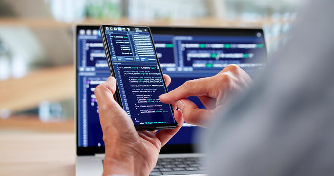 Woman Coder Working On Web Development - Powered by Adobe