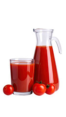Tomato juice in a glass and pitcher, next to fresh tomatoes