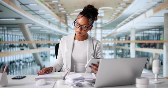 Hardworking Accountant Crunches Numbers Diligently On Computer - Powered by Adobe