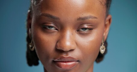 Face, serious and black woman in studio with pride, skill development or education opportunity. Portrait, student and person in closeup with confidence, college program or academic on blue background