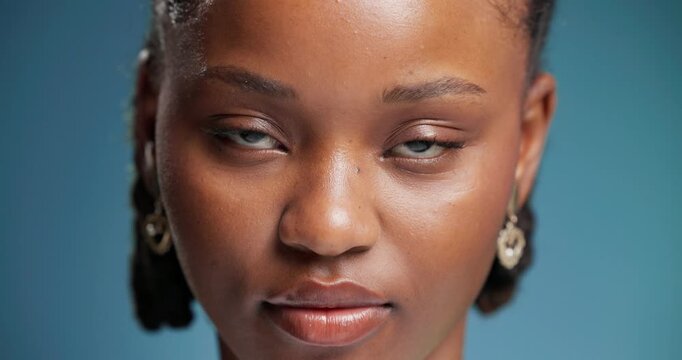 Face, serious and black woman in studio with pride, skill development or education opportunity. Portrait, student and person in closeup with confidence, college program or academic on blue background