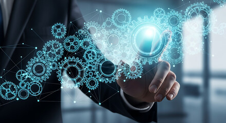 Businessman touching a futuristic digital interface with glowing blue gears and cogs for process automation and innovation