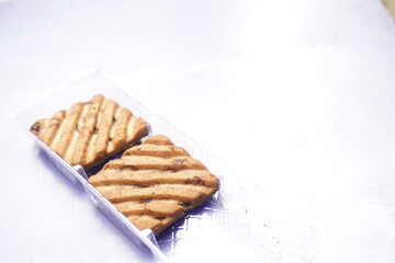 Hide and Seek chocolate biscuits are crunchy, delicious cookies loaded with rich chocolate chips, offering a perfect blend of sweetness and crunch