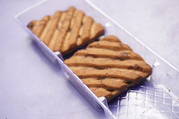 Hide and Seek chocolate biscuits are crunchy, delicious cookies loaded with rich chocolate chips, offering a perfect blend of sweetness and crunch