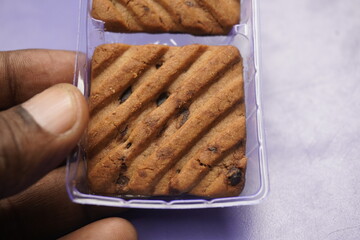 Hide and Seek chocolate biscuits are crunchy, delicious cookies loaded with rich chocolate chips, offering a perfect blend of sweetness and crunch