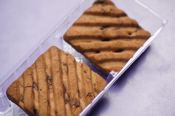 Hide and Seek chocolate biscuits are crunchy, delicious cookies loaded with rich chocolate chips, offering a perfect blend of sweetness and crunch