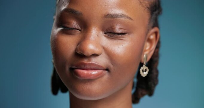 Face, remember and thinking with black woman in studio for contemplation, memories or nostalgia. Future, ideas and question with happy African person on blue background for planning or vision