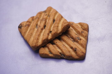 Hide and Seek chocolate biscuits are crunchy, delicious cookies loaded with rich chocolate chips, offering a perfect blend of sweetness and crunch