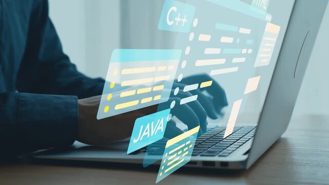Close-up of Hands Typing on Laptop Keyboard with Programming Code Elements and Digital Symbols Representing Various Programming Languages and Technologies. Qubit.
