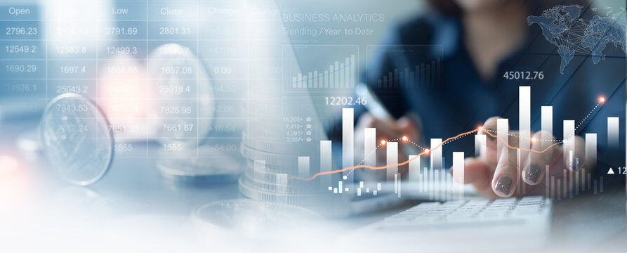 Business, finance and investment concept. Business woman analyzing and calculating financial data with economic graph growth chart, Business strategy and planning. digital market research
