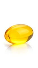 Single yellow gelatin capsule on white background