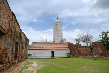 The white main prang and ruins inside Wat Phutthaisawan, Ayutthaya, Thailand