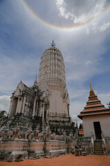 White main prang and sun halo at Wat Phutthaisawan, Ayutthaya, Thailand