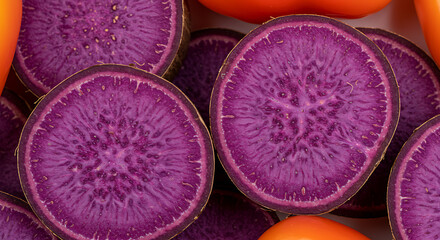 
Macro Close-Up of Sliced Purple Ube Yam and Pile of Pink-Purple Sweet Peppers – Vivid Root Vegetable Texture.close up of a pile of pink and purple sweet pepper, Macro shot of sliced purple ube yam 