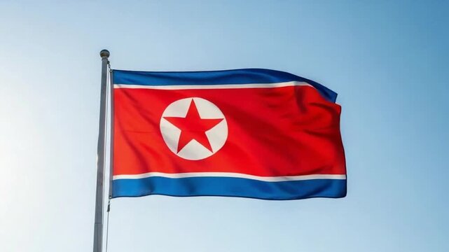 North Korea National Flag Waving in Clear Blue Sky
