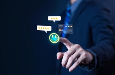 Businessman touching virtual screen with smiling face and five-star customer review, representing positive feedback, high satisfaction, excellent service, and successful business reputation concept.