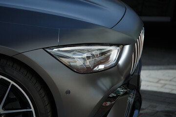 Headlights of a modern car close up