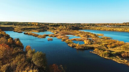 Aerial view of flooded quarry and landscape