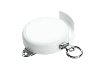 White coiled device with a ring attached, on a dark background