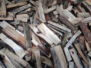 Natural background, pile of firewood, wood for heating a rural house