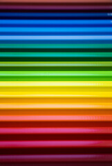 Multicolored background. Colored pencils. Drawing lesson. Creativity.