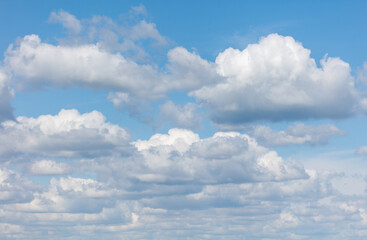 A blue sky with many clouds