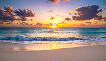 A tranquil beach scene featuring a vibrant sunrise, with golden light reflecting on the water and soft clouds overhead