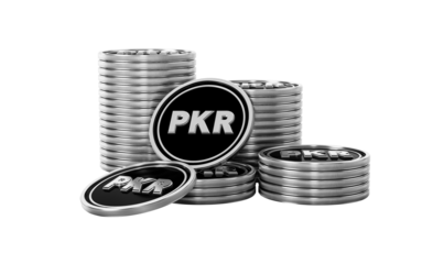 Stacked silver Pakistani Rupee PKR coins, symbolizing finance and investment.